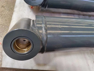 Brazo nivelador hidráulico para tractor